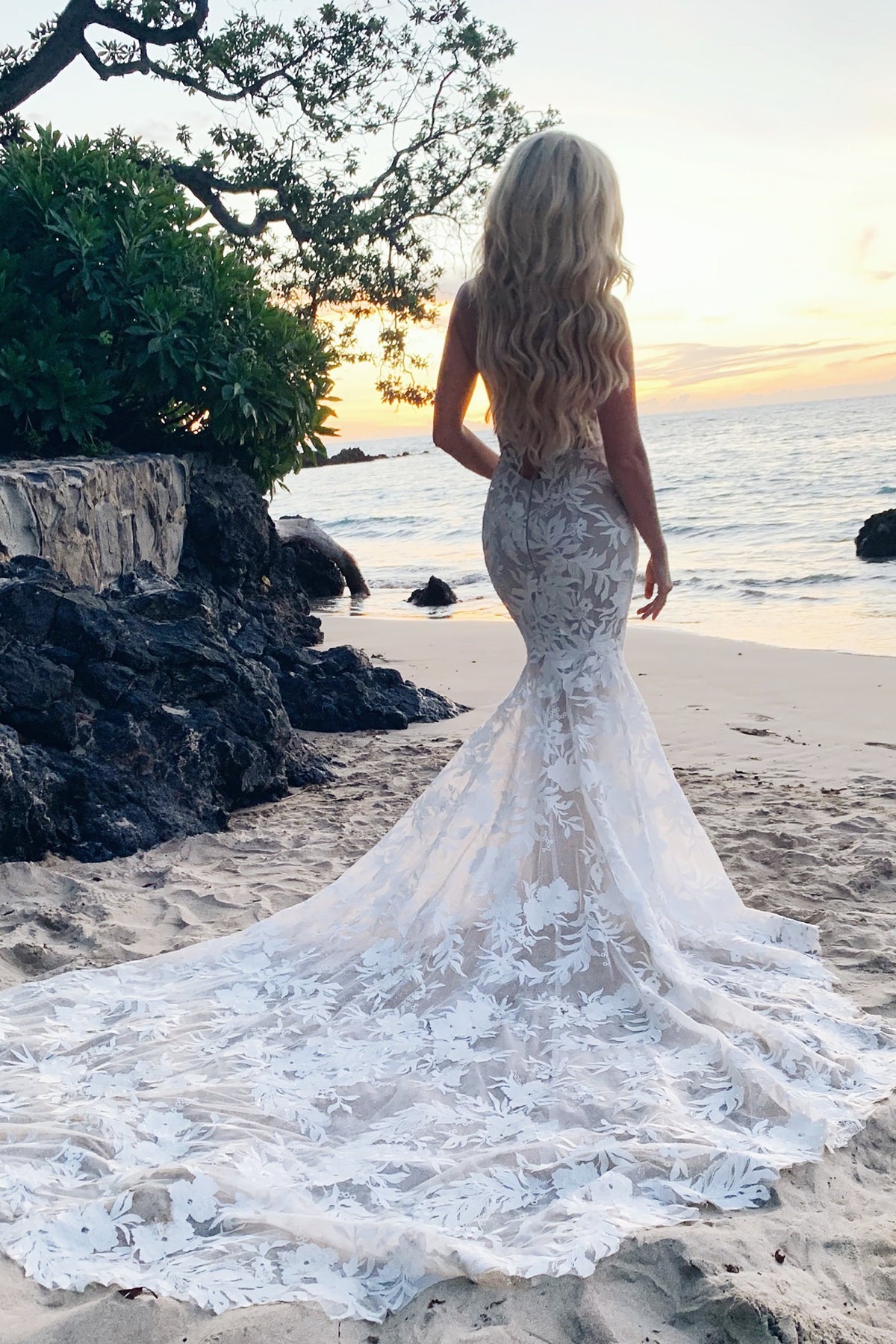 Sheer low back beach bridal gown with long train